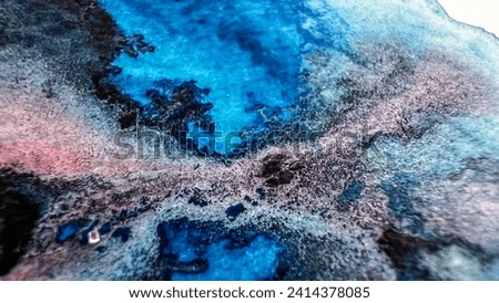 Abstract macro watercolor splashes color pink turquoise black blue on paper. Watercolour stains. Mixing aquarelle paints. Soft focus. Film grain pixel texture. Defocused painting background