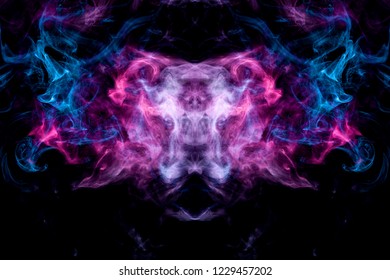 Abstract magic background. Cloud of  pink and blue smoke in the form of a skull, monster, dragon on a black isolated background. 