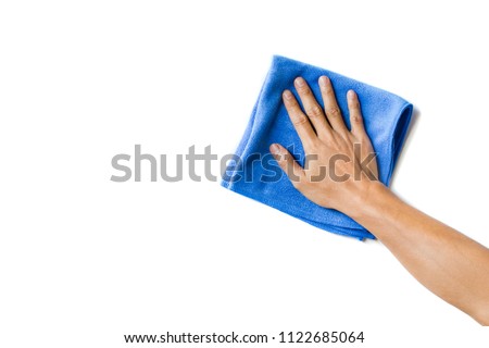 Abstract male hand holding blue microfiber cleaning cloth on white. Background copy space for add text or art work design. 