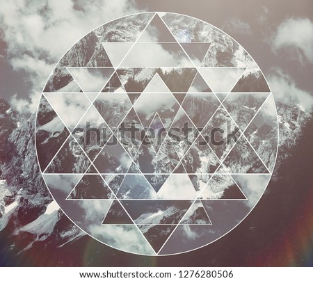 Abstract meditative collage with the image of the mountain landscape and the sacred geometry symbol shri yantra. Harmony, spirituality, unity of nature. 