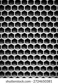 Abstract metal hexagonal grid background with repeating pattern and industrial texture for modern design and technology visuals