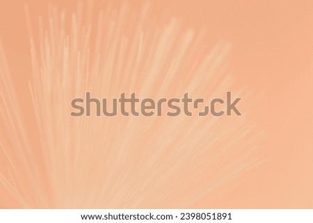 Abstract minimalistic banner with optical fiber colored in Peach Fuzz - color of the year 2024.