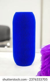 Abstract model printed on 3D printer. 3D printer created object from molten plastic. Modern three-dimensional printing technologies. 3D printer and 3D printing. Innovation additive robotic technology