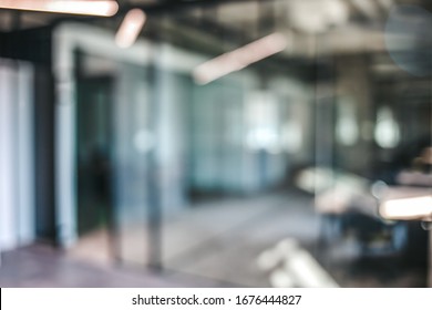 Abstract Modern Business Office Blur Background - Library Room Interior Blurred White And Gray Bokeh Lights Background With Motion Blur For Your Design. 