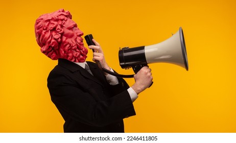 Abstract modern collage. The man with the plaster head of David with a megaphone on yellow background - Shutterstock ID 2246411805