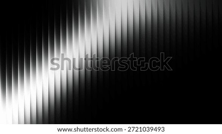 Abstract monochrome gradient background featuring a diagonal pattern of light and shadow. The black and white tones create a dynamic and modern visual effect.
