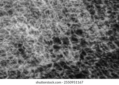 Abstract Monochrome Light Trails Texture with Chaotic Swirling Patterns in Black and White