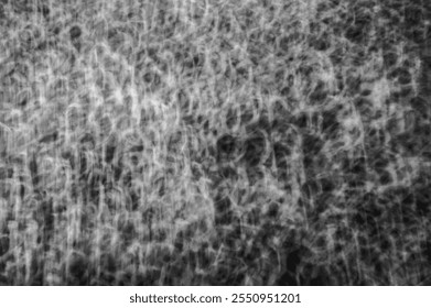 Abstract Monochrome Light Trails Texture with Chaotic Swirling Patterns in Black and White