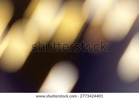 Abstract motion blur background creating warm golden light streaks and atmospheric glow