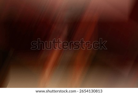 an abstract motion blur effect dominated by warm tones such as deep red, burnt orange, and soft brown.