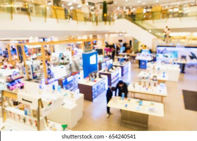 Abstract Motion Blurred of Booth Shop in Shopping Mall, Defocused Blurry of Fair Exhibition in Department Store With Interior Modern Decorative and Bokeh Light, Abstract Background