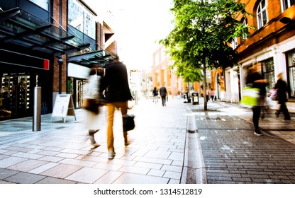 Abstract Motion Blurred Shoppers On UK High Street