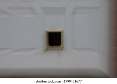 Abstract Motion Zoom Blur Of Cat Door In Garage Urban Garage Door With Feline Escape Hatch Geometric Shapes On White Overhead Door Zooming In And Out Ot Create Motion And Three Dimensional Effect 