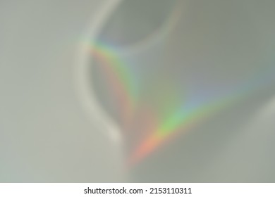 Abstract natural light refraction silhouette on water surface mock up.Caustic effect light refraction on white wall overlay photo mockup, blurred sun rays refracting through glass prism with shadow