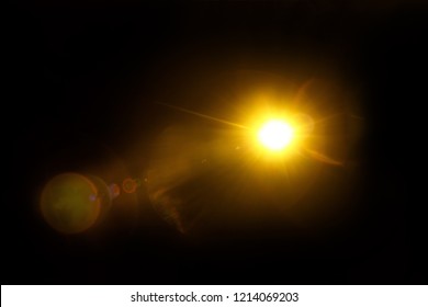 Abstract Natural Sun flare on the black background. - Shutterstock ID 1214069203