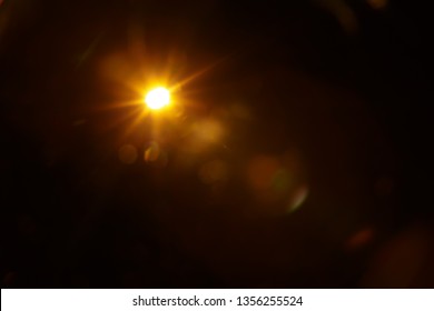 Abstract Natural Sun flare on the black - Shutterstock ID 1356255524