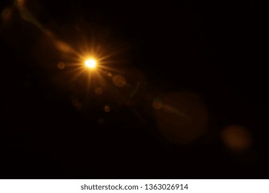 Abstract Natural Sun Flare On The Black