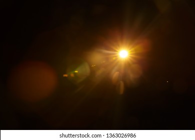 Abstract Natural Sun flare on the black - Shutterstock ID 1363026986