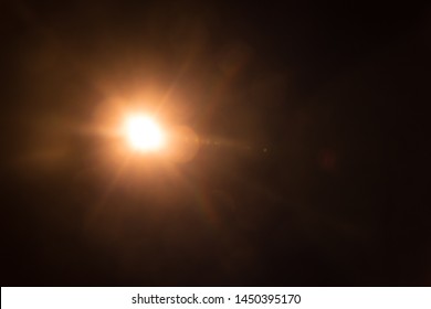 Abstract Natural Sun flare on the black - Shutterstock ID 1450395170