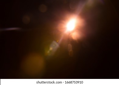 Abstract Natural Sun flare on the black - Shutterstock ID 1668753910