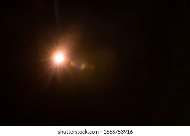 Abstract Natural Sun flare on the black - Shutterstock ID 1668753916