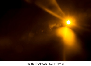 Abstract Natural Sun Flare On The Black