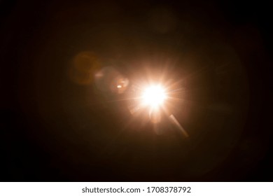 Abstract Natural Sun Flare On The Black