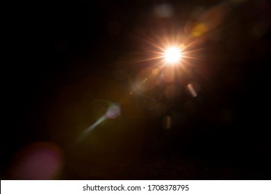 Abstract Natural Sun flare on the black - Shutterstock ID 1708378795