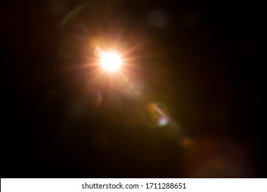 Abstract Natural Sun flare on the black - Shutterstock ID 1711288651