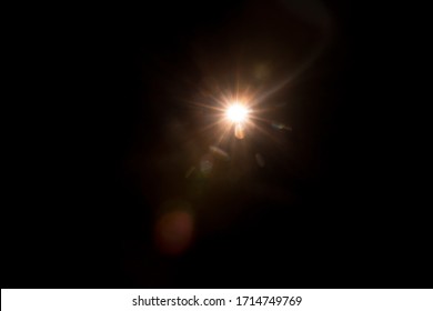 Abstract Natural Sun flare on the black - Shutterstock ID 1714749769