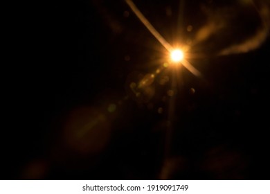 Abstract Natural Sun flare on the black - Shutterstock ID 1919091749
