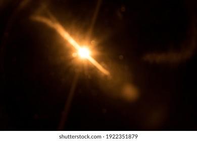 Abstract Natural Sun Flare On The Black