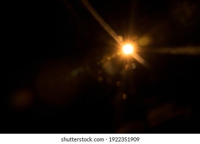 Abstract Natural Sun flare on the black - Shutterstock ID 1922351909