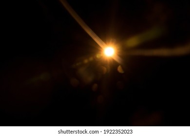 Abstract Natural Sun flare on the black - Shutterstock ID 1922352023