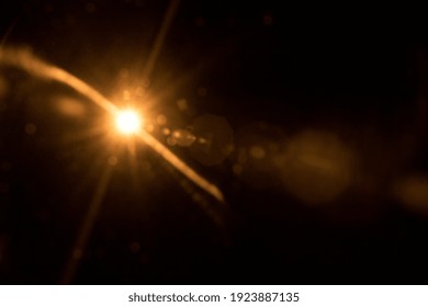 Abstract Natural Sun Flare On The Black