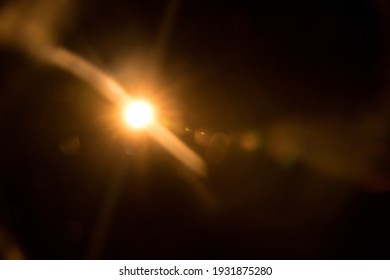 Abstract Natural Sun flare on the black - Shutterstock ID 1931875280