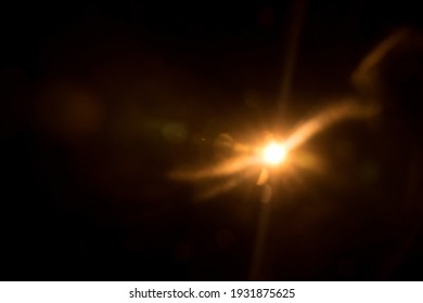 Abstract Natural Sun flare on the black - Shutterstock ID 1931875625