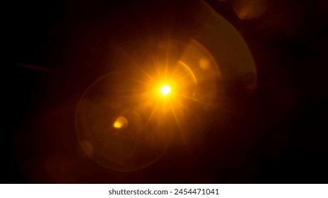 Abstract Natural Sun flare on the black. - Powered by Shutterstock