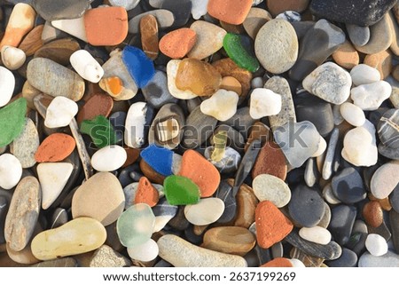 Abstract nature pebbles background. Blue stone pebbles texture. Stone background. Blue vintage color. Sea pebble and sea glass beach. Beautiful nature background. Sea pebbles wallpaper in colorful.