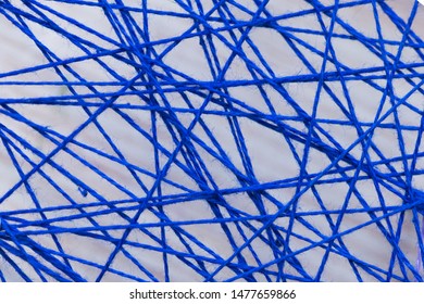 Abstract network from thread fiber, yarn textile strings close-up
