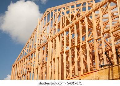 Abstract Of New Home Construction Site Framing.