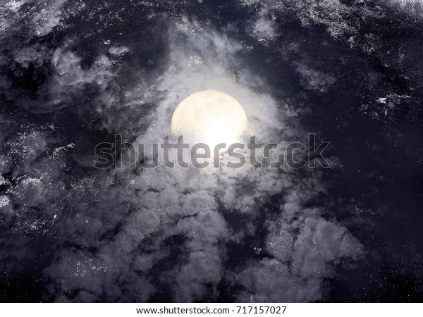 Abstract night sky with full moon for\
halloween background. Grunge and noise filter\
effect.