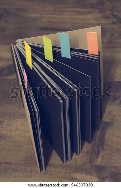  Abstract\
notebook with color note tab\
