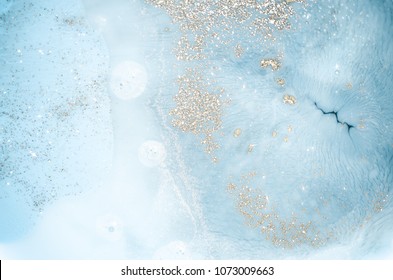 Abstract ocean- ART. Natural Luxury. Style incorporates the swirls of marble or the ripples of agate. Very beautiful blue paint with the addition of gold powder - Shutterstock ID 1073009663