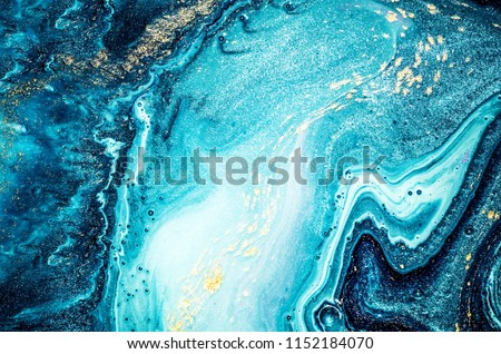 Abstract ocean- ART. Natural Luxury. Style incorporates the swirls of marble or the ripples of agate. Very beautiful blue paint with the addition of gold powder.