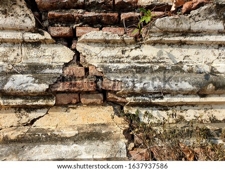 Abstract old concrete wall texture of Buddhist chapel.