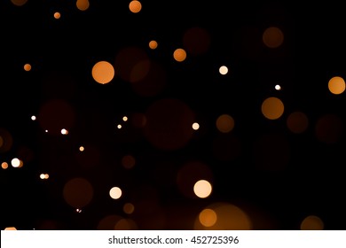 Abstract Orange Bokeh In Black Back Ground