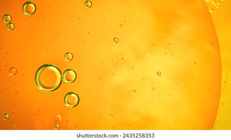 Abstract orange colorful background with oil on water surface. Oil drops in water abstract psychedelic, abstract image. Foto Stok