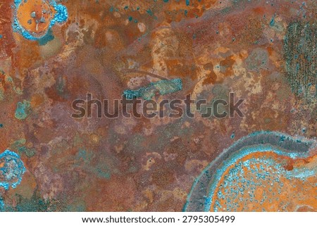 Abstract oxidized copper texture with verdigris patina, colorful corrosion patterns and weathered metal surface