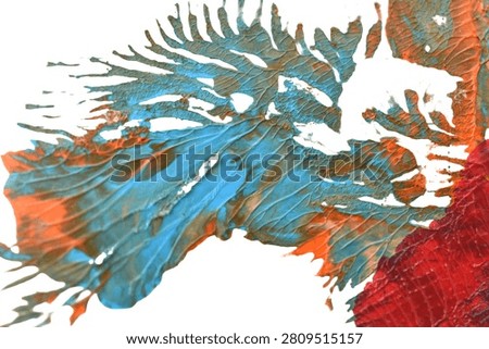 An abstract painting created using the liquid art or marbling technique. The composition features chaotic tree-like structures with vibrant blue, orange, and red splashes.